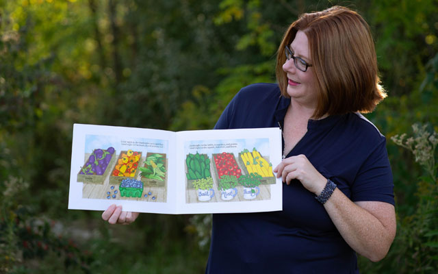 Kathleen showing her book